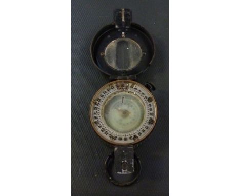 A 1942 MKIII military-issue compass.