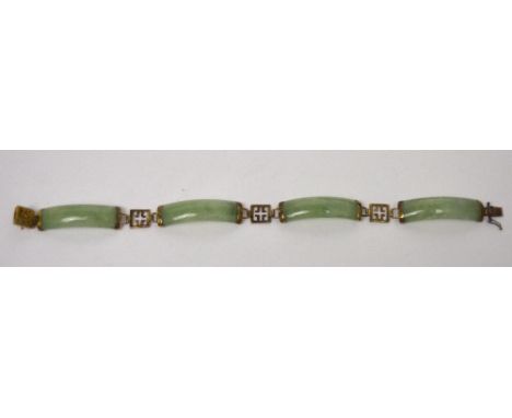 A 9ct gold and jade link bracelet.