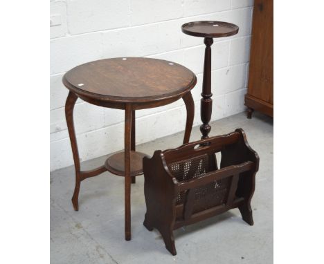 An Edwardian oak circular occasional table raised on hipped supports with under-shelf, diameter approx 61cm, a reproduction o