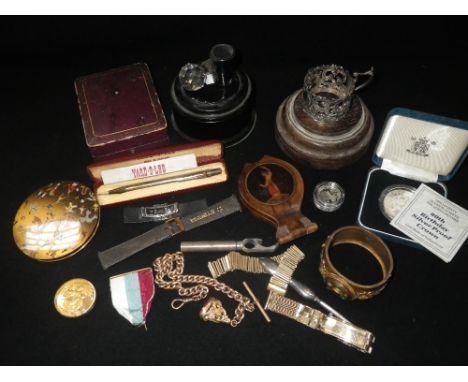 A ROYAL MINT SILVER PROOF CROWN 1990 a gold plated watch chain, trophy stands and sundries