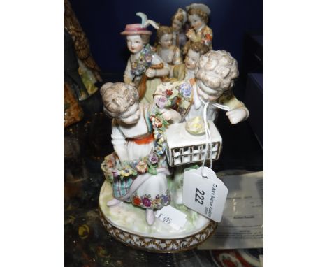FOUR CONTINENTAL PORCELAIN GROUPS OF CHILDREN playing musical instruments and other activities (4)
