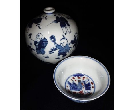 A CHINESE PORCELAIN VASE of bulbous form, with blue painted and printed decoration of children playing and one other porcelai
