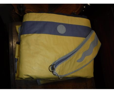 A PAIR OF APPLIQUE CURTAINS in yellow and blue with tie-backs