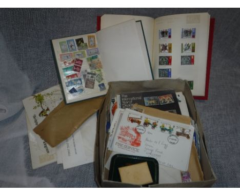 A COLLECTION OF GREAT BRIATIN AND WORLD STAMPS contained in albums and loose and a selection of First Day Covers