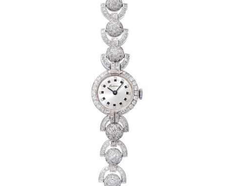 Damen Schmuckuhr komplett ausgefasst mit Diamanten von zus. ca. 4,2 ct, überwiegend Achtkantschliff, ca. WEISS-GW (H-K)/SI-P1