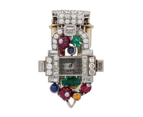 VAN CLEEF & ARPELS + AUDEMARS PIGUET Clipuhr "Tutti Frutti" mit Rubinen, Sapiren, Smaragden, Diamanten von zus. ca. 1,7 ct, g