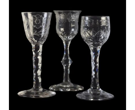 A group of three facet stemmed, engraved, and polished wine glasses, circa 1790, one with petal cut foot, 15.5cm high and sma