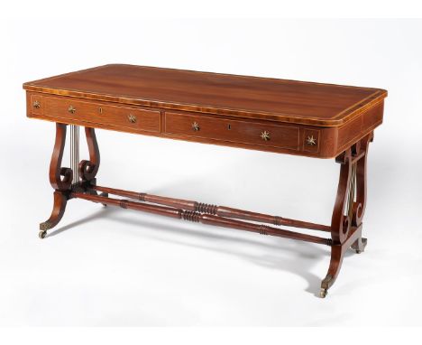 A Regency partridge wood and satinwood crossbanded library table, circa 1815, attributed to Gillows, the rectangular top with