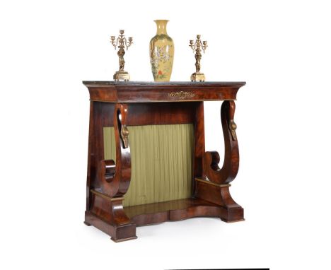 A mahogany and parcel gilt console table, in Empire taste, first half 19th century, the rectangular white veined black marble