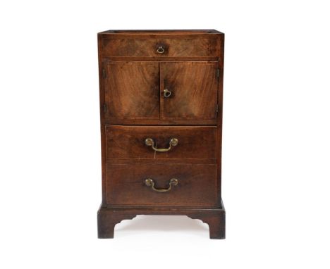 A George III mahogany night commode, circa 1780, the rectangular dished top within a moulded edge, above a false drawer, a pa