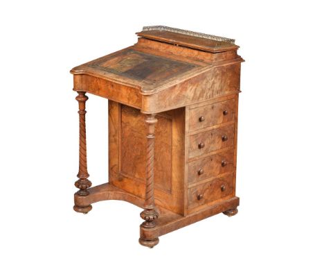 A Victorian walnut Davenport, circa 1870, the top drawer and front edge both stamped for the maker and serial numbered WILKIN