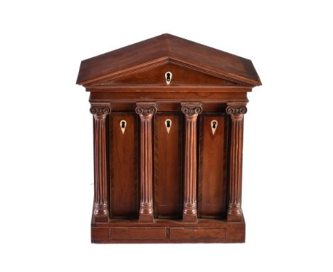 A mahogany and tulipwood banded collector’s cabinet, late 19th/ early 20th century, of architectural form, the hinged top ope