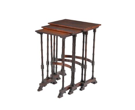 A nest of three rosewood side tables, first quarter 19th century, the largest 76cm high, 54cm wide, 35cm deep.  ϒ  Indicates 