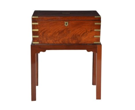 A mahogany and brass-bound and inlaid deed box, first quarter 19th century, the lid with inset brass cartouche and opening to