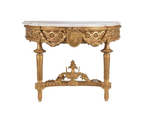 A Continental giltwood and marble topped console table, 19th century, the variegated white marble top above pierced frieze, f