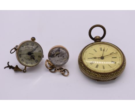 A vintage Solvil et Titus Swiss ball watch; together with a similar example; and a pocket watch. 