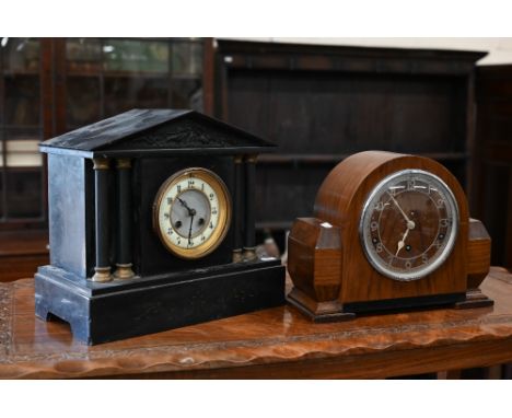 A 19th century slate architectural mantel clock with twin train movement striking on coiled gong, 32 x 16 x 28 cm high to/w A