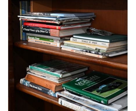 A collection of vintage and later books on motoring, to/w a chrome and enamel Bentley Drivers' Club car-badge 