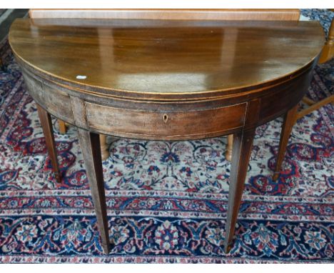 A Victorian boxwood inlaid mahogany demi-lune tea table raised on double gate legs to spade toes, 102 cm wide x 48 cm (96 cm 