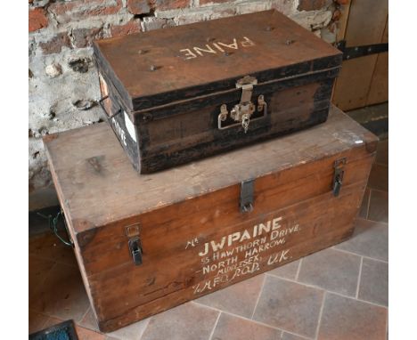 A vintage pine metal bound trunk inscribed 'JW Paine' followed by full address, 95 cm w x 47 cm d x 45 cm h, to/w another 'Pa