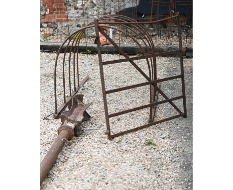 An antique cast and wrought iron three-piece 'kissing gate', as removed, stored and found 