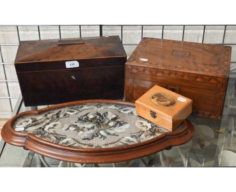 A 19th century mahogany tea caddy, the brass plate and loop handles modelled as Austro Hungarian double eagle to/w a parquetr