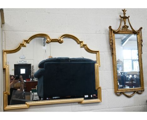 A modern overmantel mirror in decorative moulded gilt frame 106 cm wide x 80 cm high to/w another gilt framed wall mirror in 