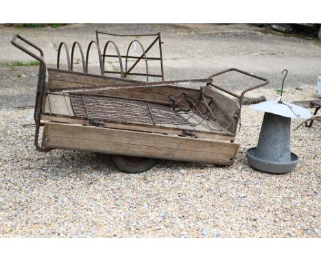 A vintage Geest wooden-bodied, drop-side, garden truck to/w a pair of saddle racks, a wrought iron fence panel, a strap hinge