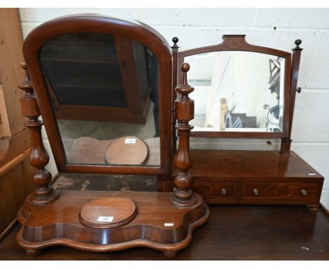 A Victorian mahogany framed toilet mirror on shaped platform base with bun feet, 58 cm wide x 24 cm deep x 58 cm high overall