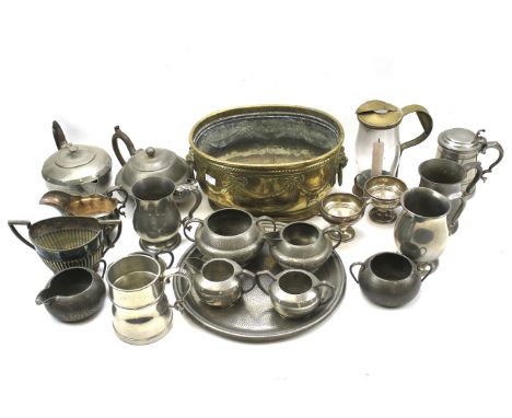 An assortment of metalware. Including a brass coal bucket, pewter tankards, silver plate, a brass lantern, etc