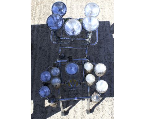 Two chrome Vespa Lambretta mod light mounts. One with five lights, the other eleven, approximately 46cm wide 