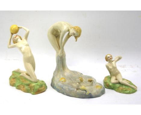 Three 20th century Art Deco Crown Devon figures of nude ladies and a young girl. Examples designed by Kathleen Parsons, one m