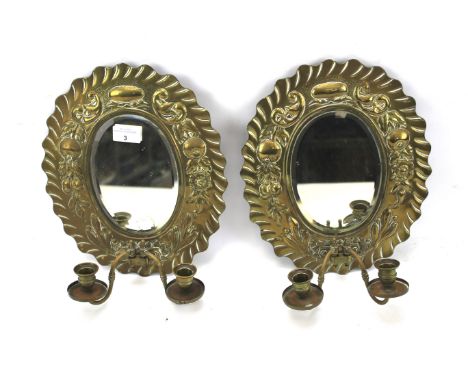 A pair of 20th century brass wall sconce mirrors. Each with two adjustable sconces, bevelled edge mirror, H31cm 