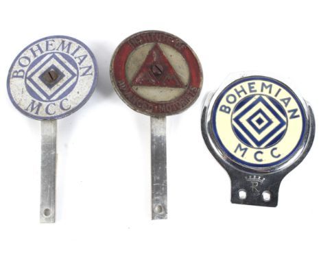 Three enamel car badges. One marked 'Institute of Advanced Motorists', the other two 'Bohemian MCC'