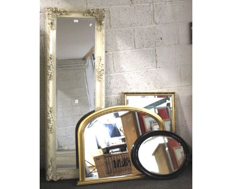 Four 20th century mirrors. To include an ornate white framed hall mirror, with bevelled edge, 57cm x 168cm, a gilt overmantel