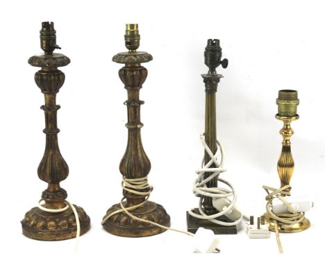 Four assorted table lamps. To include a pair of gilt baluster shaped lamps, a gilt metal Corinthian column lamp and one other