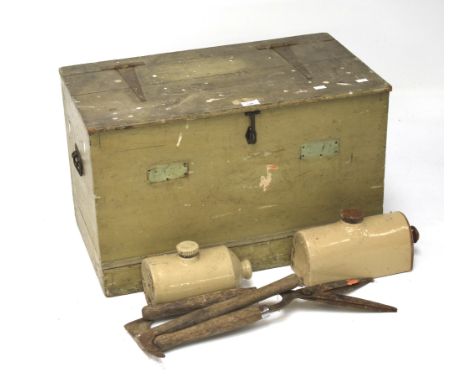 A workman's wooden trunk. Painted green, with metal latch and handles to either side, containing a selection of tools, L69 x 