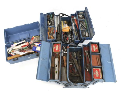 Three tool boxes, each containing a variety of tools. Including hammers, screws, brushes, etc