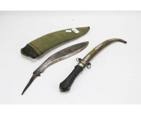 Two knives. Including a Middle Eastern blade with engraved brass and white metal scabbard and a blade (lacking handle) engrav