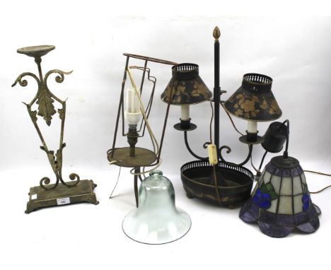 An assortment of lamps and lights. Including a leaded glass example, a cast metal light with painted decoration, etc