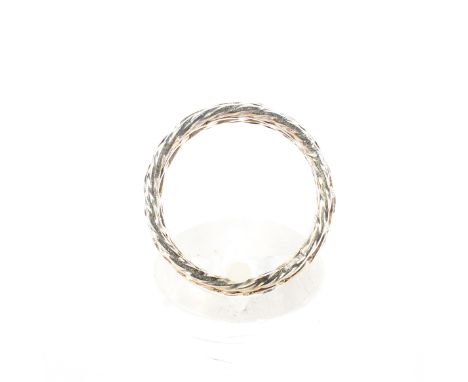 A white and rose metal and faux diamond full eternity ring. Pierced woven shank with single cut stones, size L, weight 4g.  