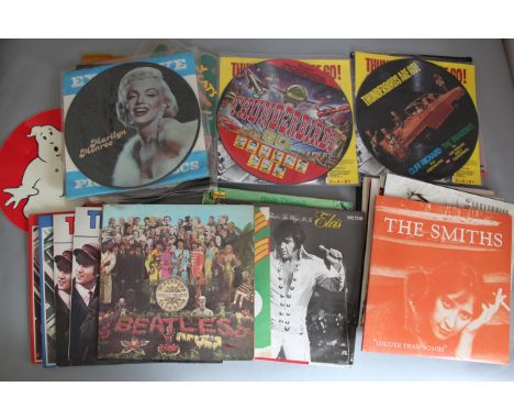 Vinyl Picture discs for Marilyn Monroe, Thunderbirds, Ghostbusters, Stray Cats etc. plus LPs including The Beatles Sgt. Peppe