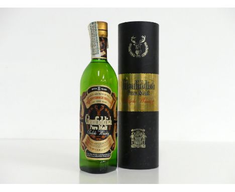 1 75-cl bt Glenfiddich Over 8 years Pure Malt Scotch Whisky 86° proof, Spanish Import slip, original Tube (sl damaged)
