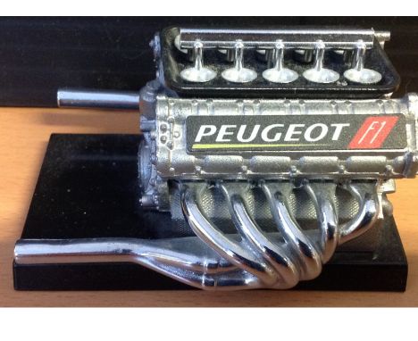 Motor Sport Model Formula One Peugeot engine scale model. Good Condition. All signed pieces come with a Certificate of Authen