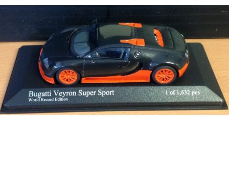 Motor Racing Model Bugatti Veryon Super Sport 2010 1. 43 scale model. Good Condition. All signed pieces come with a Certifica