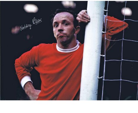 Autographed 16 x 12 photo, NOBBY STILES 1970, a superb image depicting the midfielder staring into the camera as he leans on 