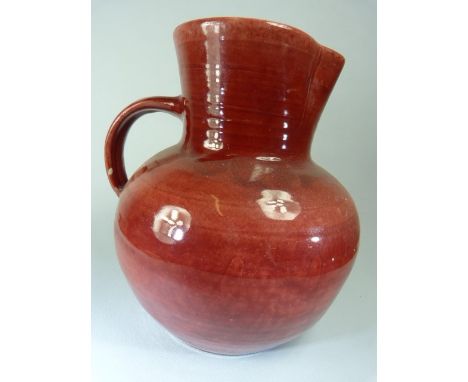 Brannam, Barnstaple, Red ground jug of large form. Stamped Royal Barumware. 