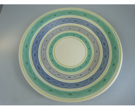 Poole Pottery 1950's Freeform charger decorated in banded purples and greens. approx diameter 33cm