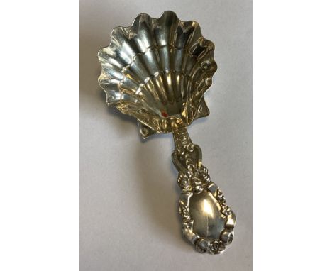A 19th Century French silver caddy spoon. Approx. 10 grams. Est. £30 - £40.