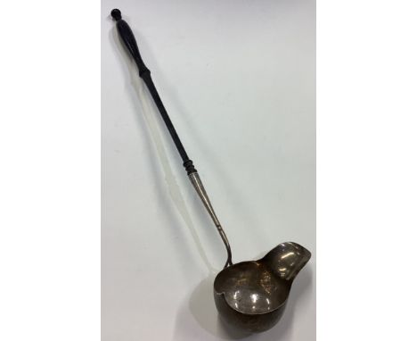 A 19th Century French silver and whalebone toddy ladle. Approx. 86 grams. Est. £40 - £60.